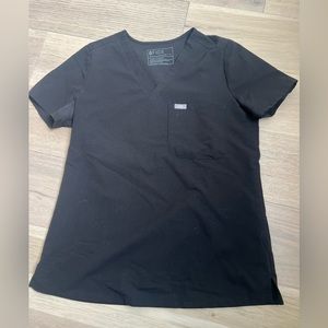 Figs one-pocket black top. Size small.